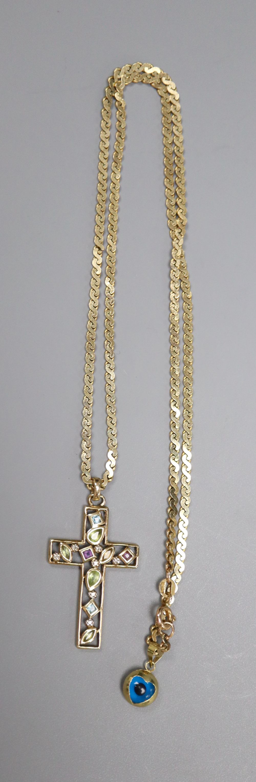 A modern 9ct gold multi-gem-set cross (4cm) on 9ct gold chain (53cm) 14.7g